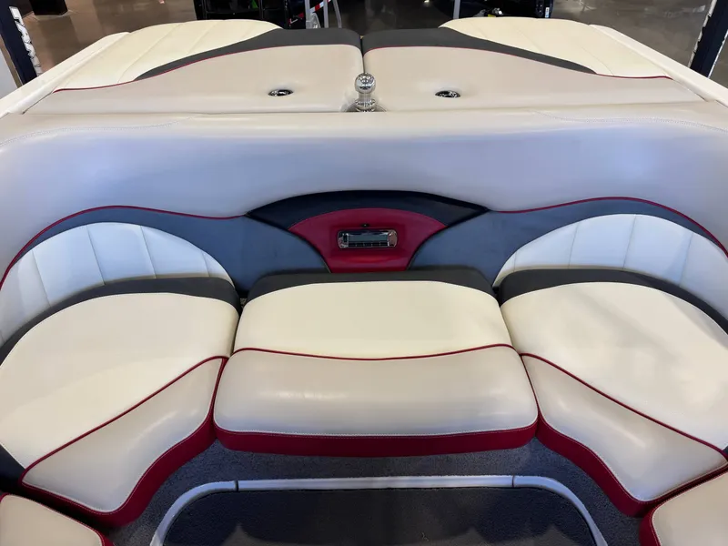 Slide: The Image of Interior of a 2012 Malibu Wakesetter 23 LSV with cream seats. - 27