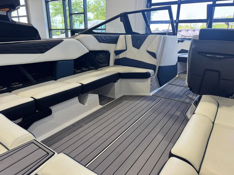 Slide: The Image of Interior of 2023 Nautique Super Air Nautique S23 with luxurious seating. - 14