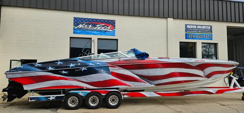 The Image of 2004 Formula 382 FASTech boat with American flag design. - 0