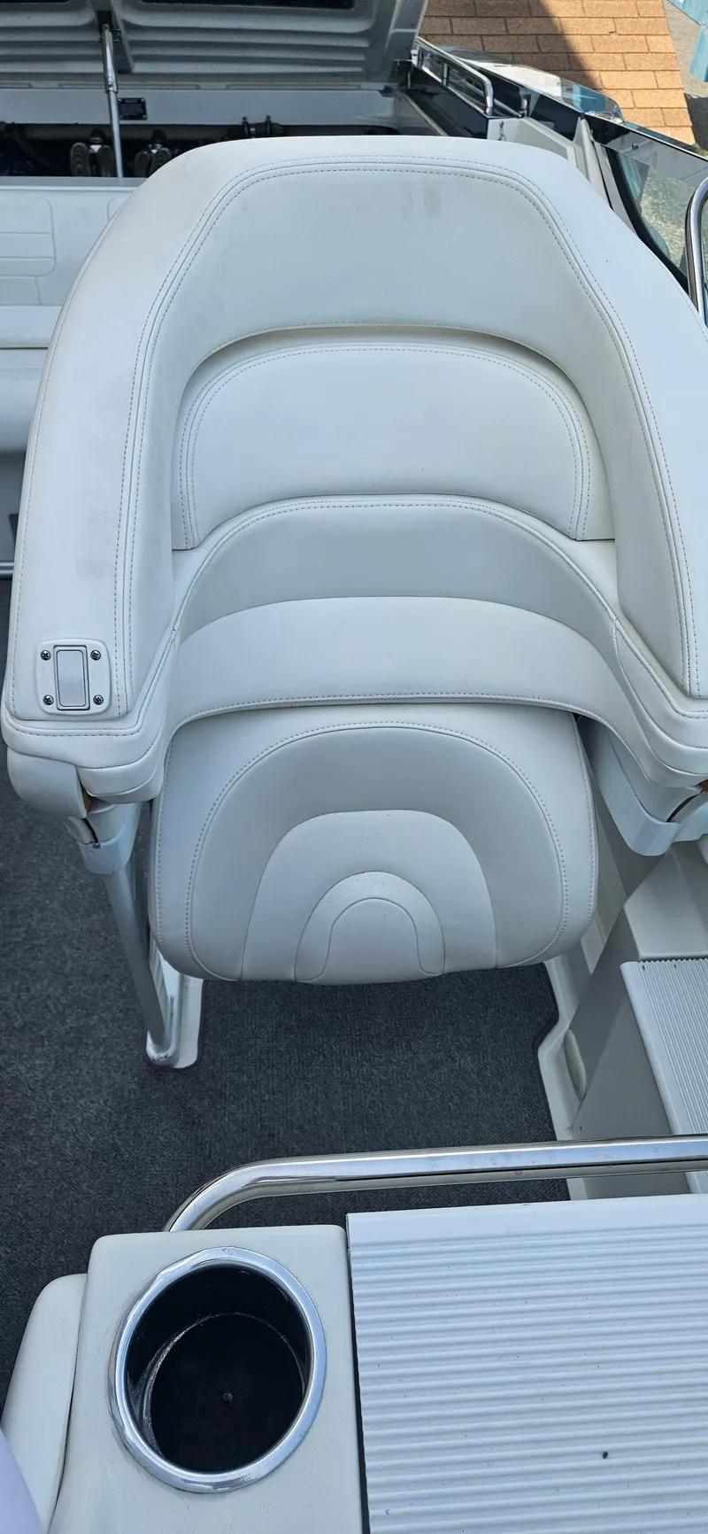 Slide: The Image of 2004 Formula 382 FASTech boat seat with white leather upholstery. - 12