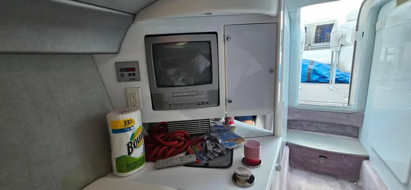 Slide: The Image of Interior of a 2004 Formula 382 FASTech boat with TV and accessories. - 18