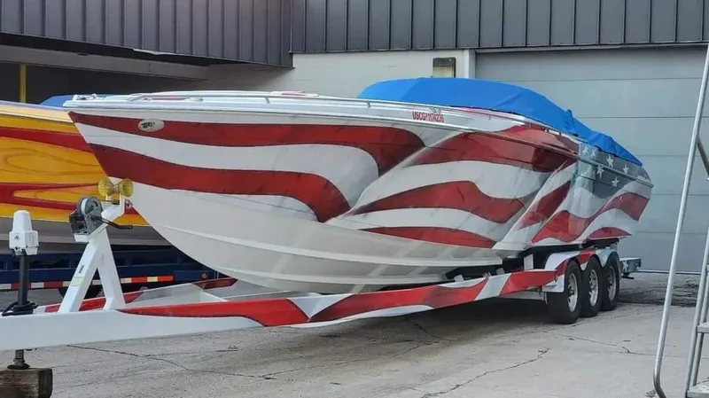 Slide: The Image of 2004 Formula 382 FASTech boat with American flag design. - 21