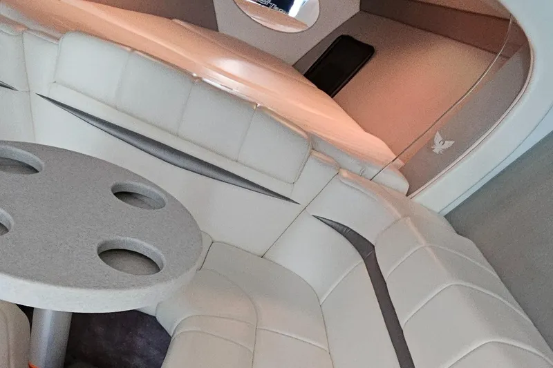 Slide: The Image of Interior of a 2004 Formula 382 FASTech with white leather and table. - 28