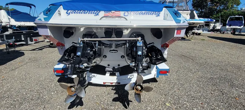 Slide: The Image of Rear view of a 2004 Formula 382 FASTech boat with dual engines. - 5