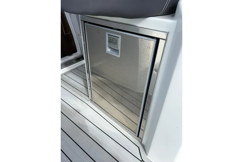 Slide: The Image of Stainless steel compartment on 2019 Jeanneau Leader 9.0 WA boat deck. - 20
