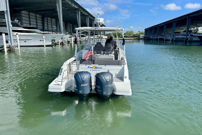 Slide: The Image of 2019 Jeanneau Leader 9.0 WA boat docked with twin Yamaha 250 engines. - 3