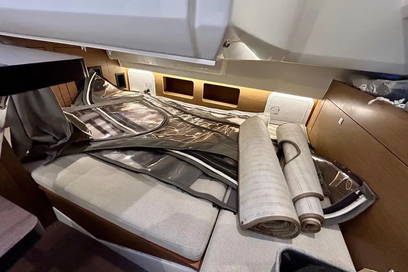 Slide: The Image of Interior of 2019 Jeanneau Leader 9.0 WA with rolled-up covers on seating area. - 30
