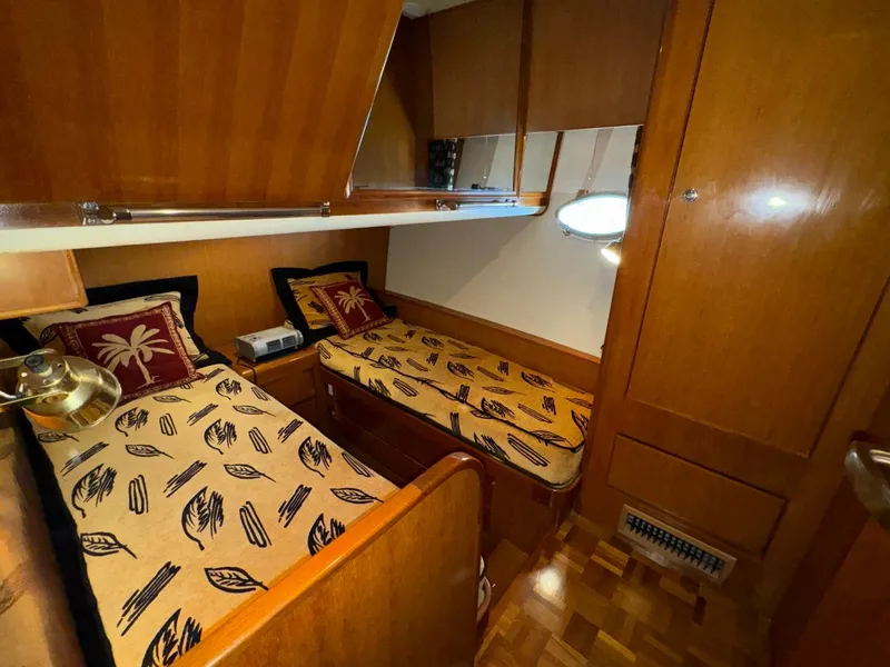 Slide: The Image of Twin cabin with wooden interior in 2004 Ocean Alexander 42 yacht. - 27