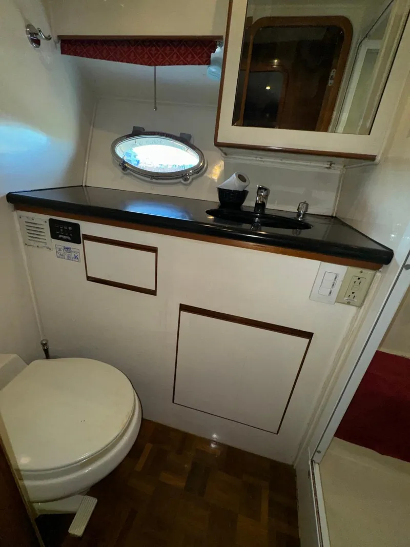 Slide: The Image of Bathroom interior of 2004 Ocean Alexander 42 yacht with sink and toilet. - 29