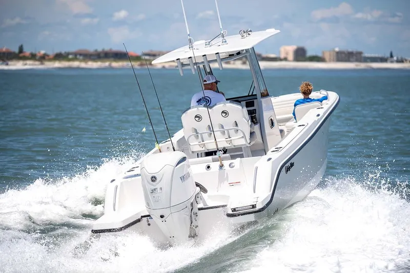 Slide: The Image of Manufacturer Provided Image: 2026 Edgewater 250CC boat cruising on open water, featuring Yamaha engine. - 19