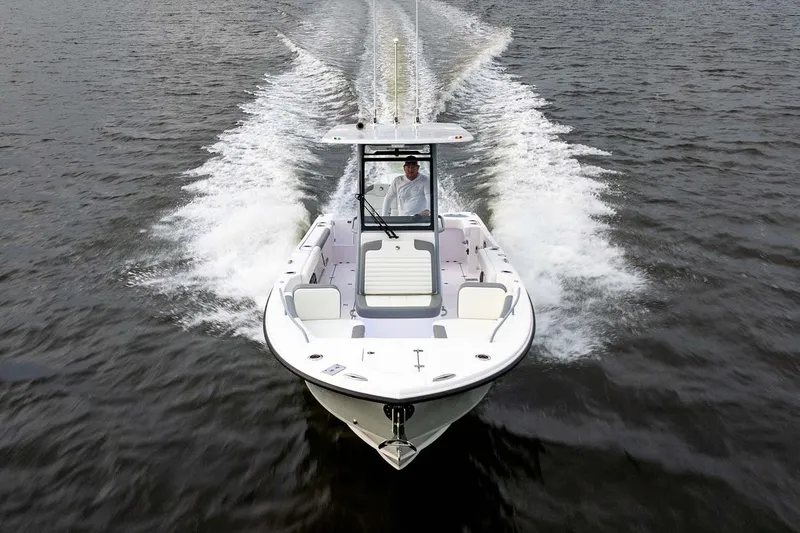Slide: The Image of Manufacturer Provided Image: 2026 Edgewater 250CC boat cruising on open water, showcasing sleek design and performance. - 20