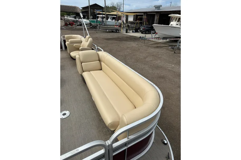 Slide: The Image of 2018 Princecraft Vectra 23 XT pontoon boat with beige seating, docked outdoors. - 12