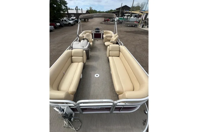 Slide: The Image of 2018 Princecraft Vectra 23 XT pontoon boat with beige seating and spacious deck. - 13