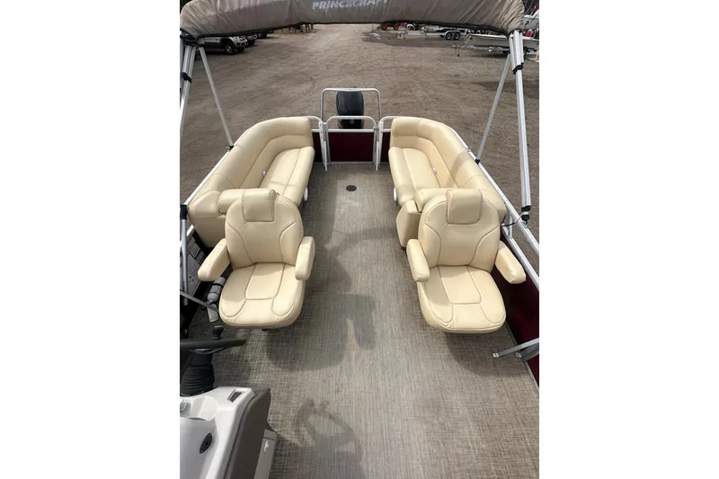 Slide: The Image of 2018 Princecraft Vectra 23 XT pontoon boat with beige seating and spacious interior. - 16