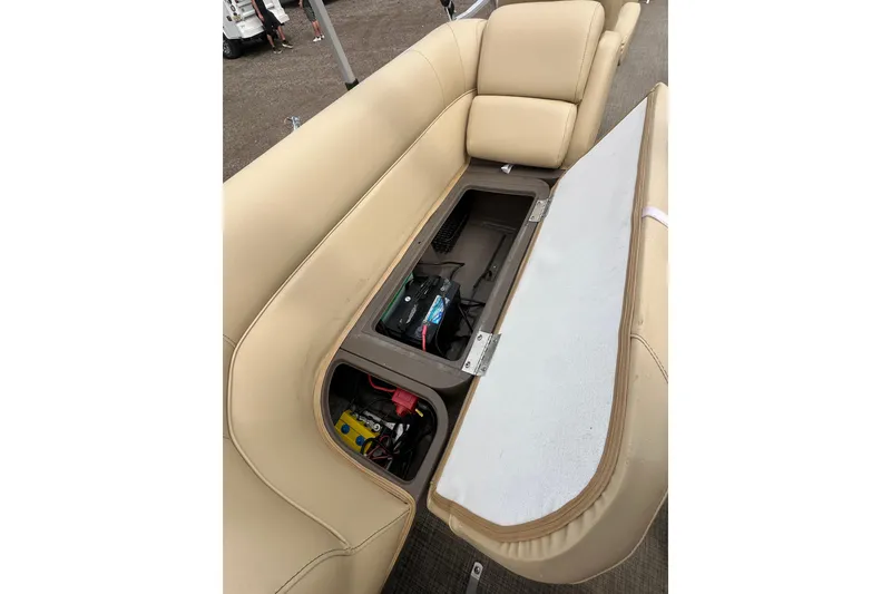 Slide: The Image of 2018 Princecraft Vectra 23 XT boat seat storage compartment with battery and wiring. - 19