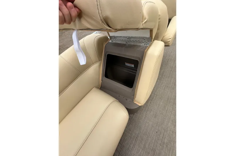 Slide: The Image of 2018 Princecraft Vectra 23 XT boat seat storage compartment, beige upholstery, open lid. - 20