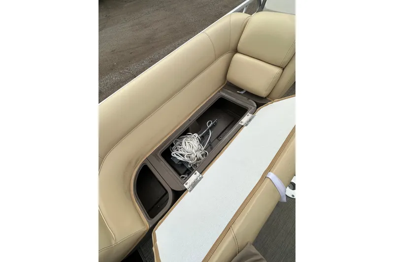 Slide: The Image of 2018 Princecraft Vectra 23 XT boat seat storage compartment with rope inside. - 22