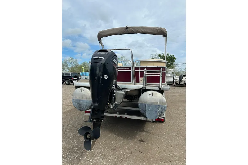 Slide: The Image of 2018 Princecraft Vectra 23 XT pontoon boat with outboard motor, parked outdoors. - 3