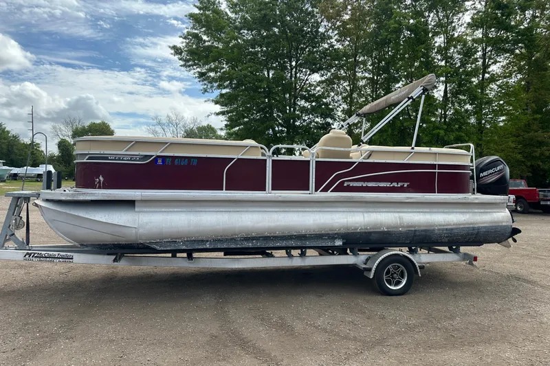 Slide: The Image of 2018 Princecraft Vectra 23 XT pontoon boat on trailer, parked outdoors. - 6