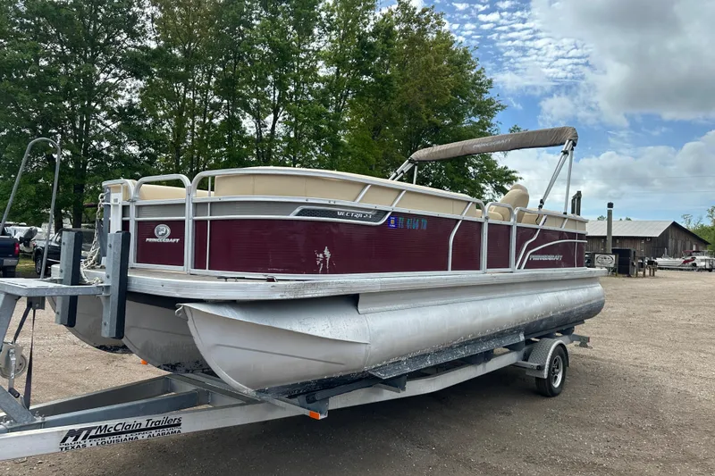 Slide: The Image of 2018 Princecraft Vectra 23 XT pontoon boat on trailer, parked outdoors. - 7