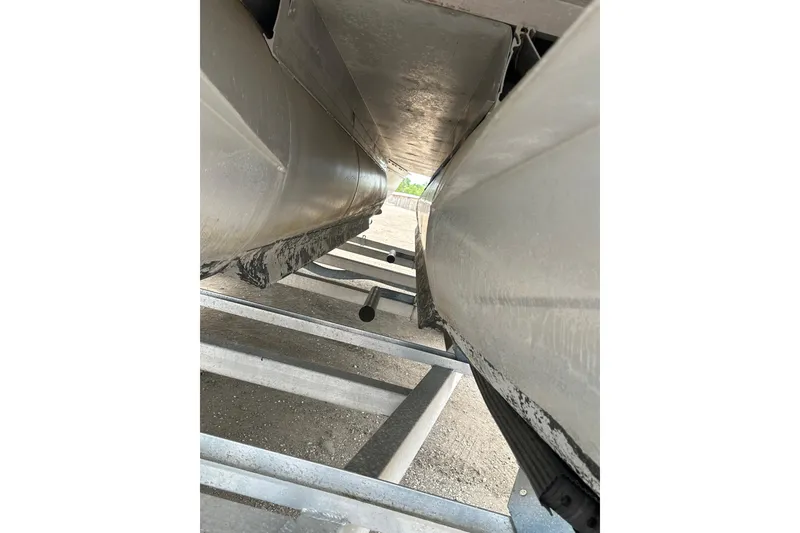 Slide: The Image of Underneath view of a 2018 Princecraft Vectra 23 XT pontoon boat on a trailer. - 9