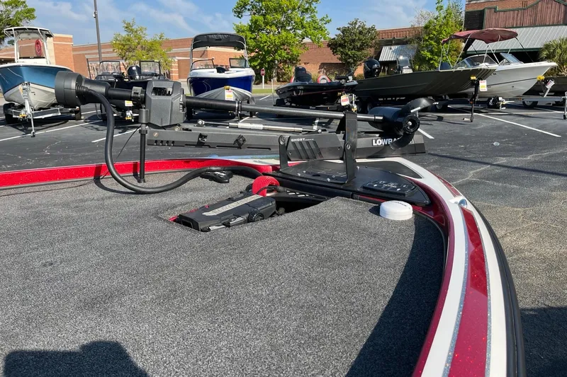 Slide: The Image of 2018 Nitro Z21 boat with Lowrance equipment in a parking lot display. - 6