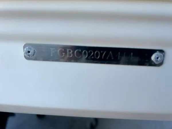 Slide: The Image of Serial number plate of a 2014 Chaparral 244 Sunesta boat. - 18