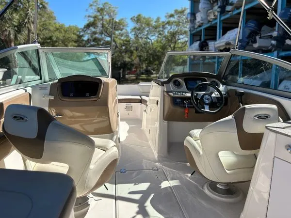 Slide: The Image of Interior of a 2014 Chaparral 244 Sunesta boat with helm console. - 20