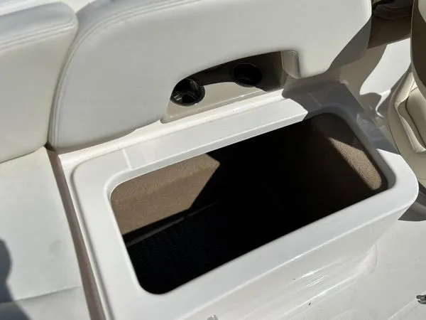 Slide: The Image of Storage compartment in Chaparral 244 Sunesta boat, 2014 model. - 28