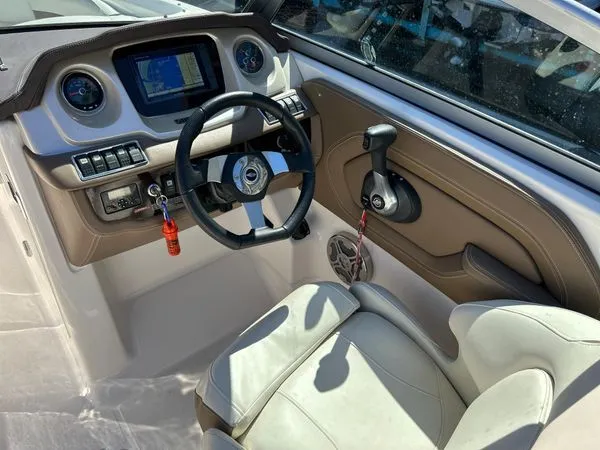 Slide: The Image of Interior view of 2014 Chaparral 244 Sunesta helm. - 31