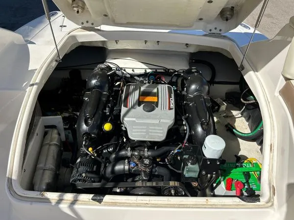 Slide: The Image of Engine compartment of a 2014 Chaparral 244 Sunesta boat. - 49