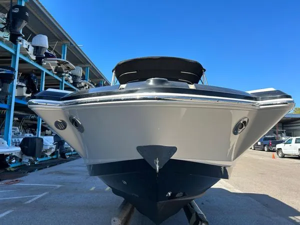 Slide: The Image of 2014 Chaparral 244 Sunesta boat in storage facility, front view. - 6