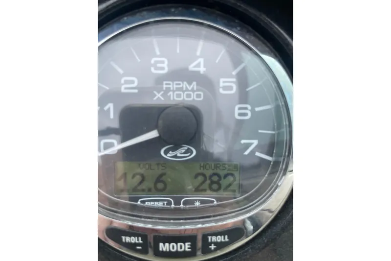 Slide: The Image of Tachometer of 2007 Sea Ray 220 Select showing 282 hours and 12.6 volts. - 14