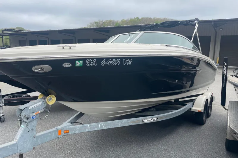 Slide: The Image of 2007 Sea Ray 220 Select boat on trailer, parked outdoors. - 7