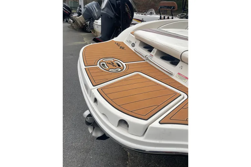 Slide: The Image of 2007 Sea Ray 220 Select boat with teak-style swim platform and seating area. - 8
