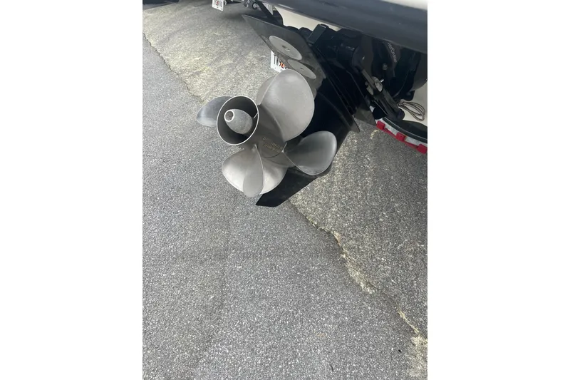 Slide: The Image of Propeller of a 2007 Sea Ray 220 Select boat on pavement. - 9