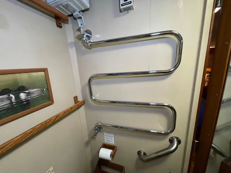Slide: The Image of Heated towel rail in 1972 Grand Banks Alaskan 55 yacht bathroom. - 28