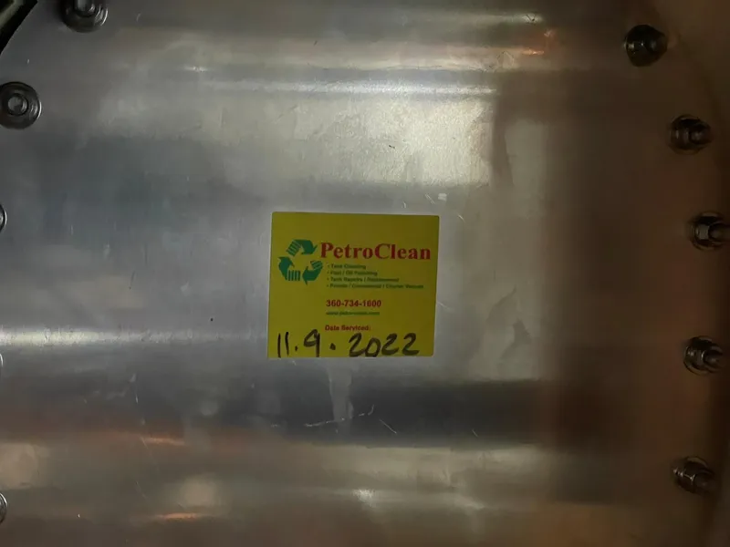 Slide: The Image of PetroClean sticker on metal surface, dated November 9, 2022, on Grand Banks Alaskan 55 yacht. - 45
