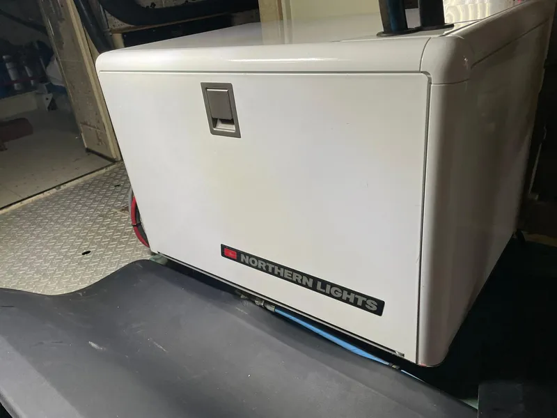 Slide: The Image of Northern Lights generator on 1972 Grand Banks Alaskan 55 yacht, interior view. - 46