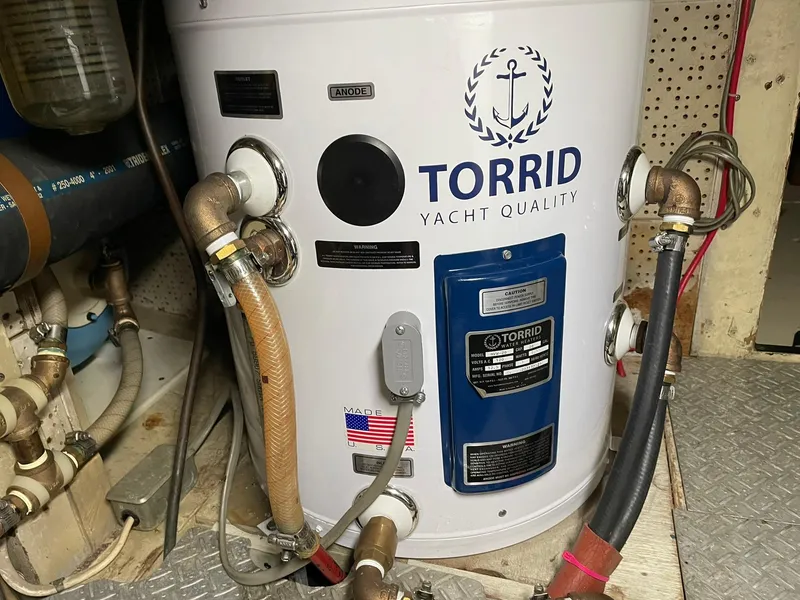 Slide: The Image of Torrid yacht water heater in a 1972 Grand Banks Alaskan 55 engine room. - 47
