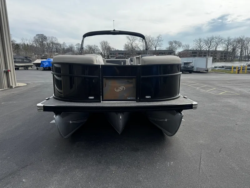 Slide: The Image of 2022 Barletta C22UC pontoon boat on parking lot, front view. - 3