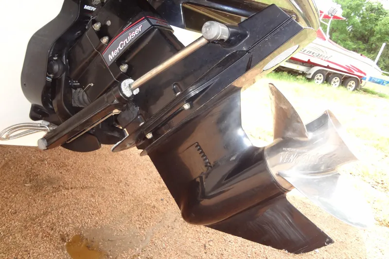 Slide: The Image of Close-up of a 2018 Sea Ray SPX 210 MerCruiser outboard motor and propeller. - 31