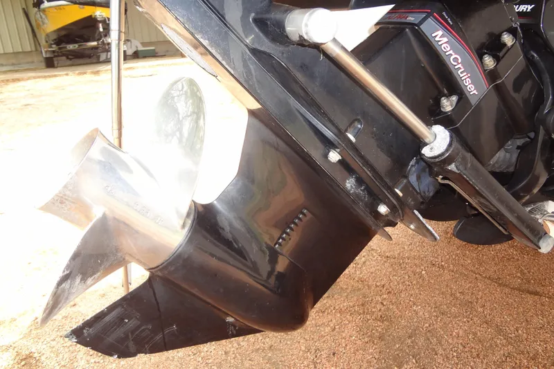 Slide: The Image of Close-up of a 2018 Sea Ray SPX 210 MerCruiser engine and propeller. - 32