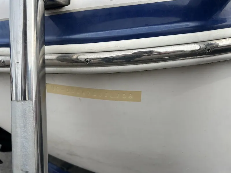 Slide: The Image of Close-up of a 2008 Tahoe Q7SI boat hull with serial number. - 15