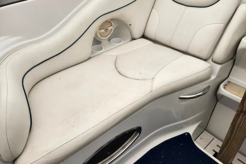Slide: The Image of White leather seating on a 2005 Crownline 275 CCR boat. - 13