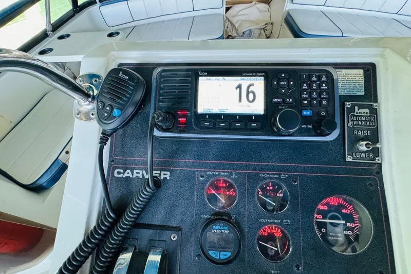 Slide: The Image of Control panel of a 1989 Carver 38 Santego boat with radio and gauges. - 39