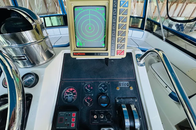 Slide: The Image of 1989 Carver 38 Santego helm with Raytheon radar and control panel. - 40