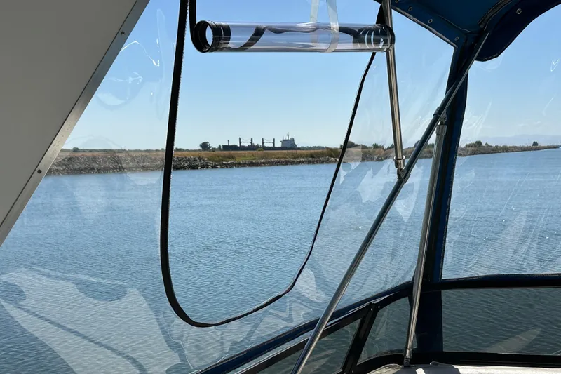 Slide: The Image of View from 1989 Carver 38 Santego overlooking calm river. - 43