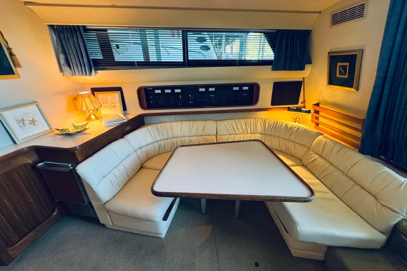 Slide: The Image of Interior of 1989 Carver 38 Santego yacht with cozy seating and elegant decor. - 51