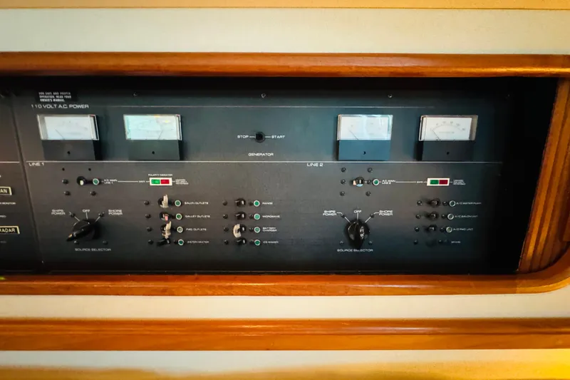 Slide: The Image of Control panel of a 1989 Carver 38 Santego boat with gauges and switches. - 72